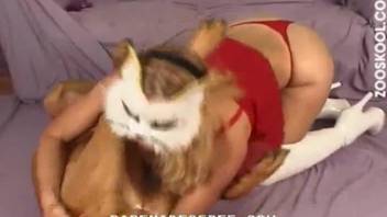 Busty mature woman feels entire dog penis in her snatch