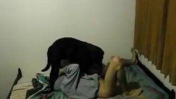 Black dog fucks tanned teen in the ass