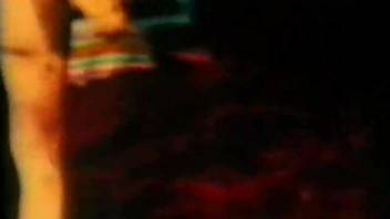 Vintage bestiality clip featuring a dark-haired woman and her canine companion