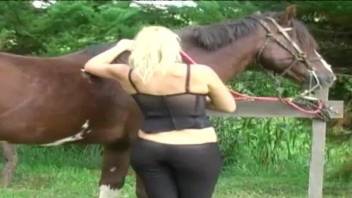 Blond-haired Latina prepares her ass for a dog cock