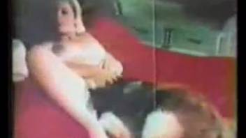Voluptuous older woman in vintage bestiality scenes involving dogs