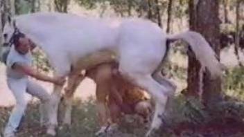 Short-haired hottie getting fucked by a white stallion