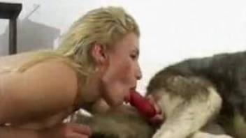 Blonde Latina deepthroats a dog's delicious dick