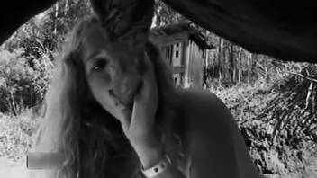 Black and white adult film starring a super aroused curvy babe