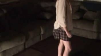 Naughty vixen in a plaid mini screwing a pup