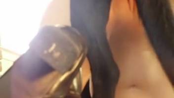 Smooth-shaven vagina being eagerly tongued by a canine