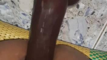 Alluring woman shoves genuine canine cock into her moist openings