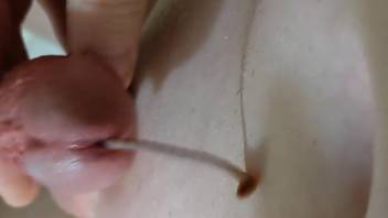 Solo male inserts worms into the dick for extra pleasure
